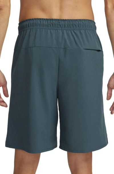 Nike Men's Unlimited Dri-fit 9" Unlined Versatile Shorts In Deep Jungle/ Deep Jungle
