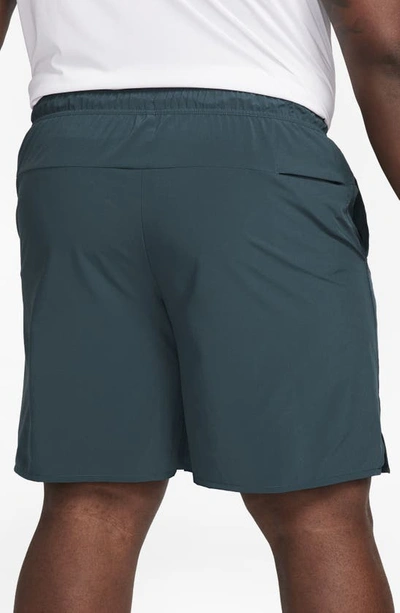 Shop Nike Dri-fit Unlimited Training Shorts In Deep Jungle/ Deep Jungle