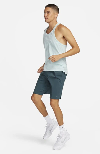 Nike Men's Unlimited Dri-fit 9" Unlined Versatile Shorts In Deep Jungle/ Deep Jungle