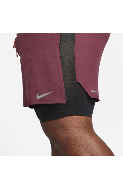 Shop Nike Dri-fit Stride Hybrid Running Shorts In Night Maroon/ Black/ Cedar