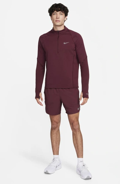 Shop Nike Dri-fit Stride 7-inch Brief-lined Running Shorts In Night Maroon/ Cedar