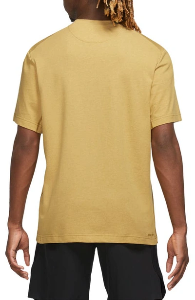 Shop Nike Primary Training Dri-fit Short Sleeve T-shirt In Bronze/ Heather