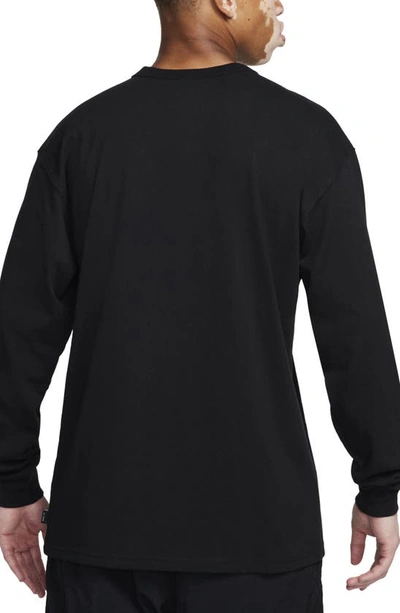 Shop Nike Long Sleeve Pocket T-shirt In Black