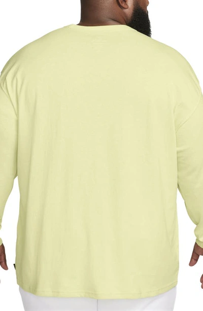 Shop Nike Sportswear Premium Essentials Long Sleeve T-shirt In Luminous Green