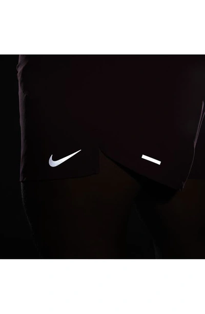 Shop Nike Dri-fit Stride Unlined Running Shorts In Night Maroon/ Cedar