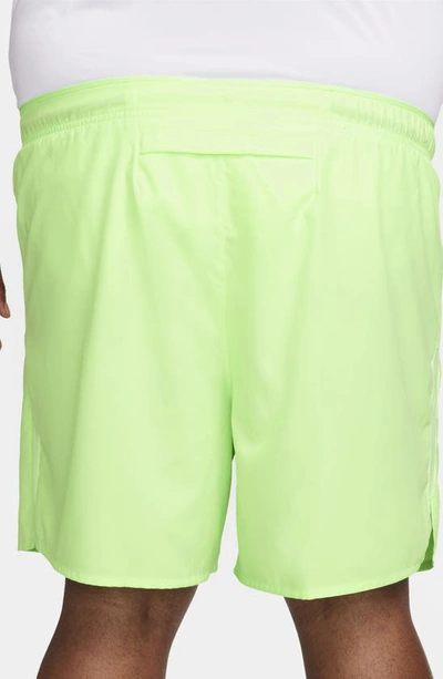 Shop Nike Dri-fit Challenger Athletic Shorts In Lime Blast/ Lime Blast/ Black