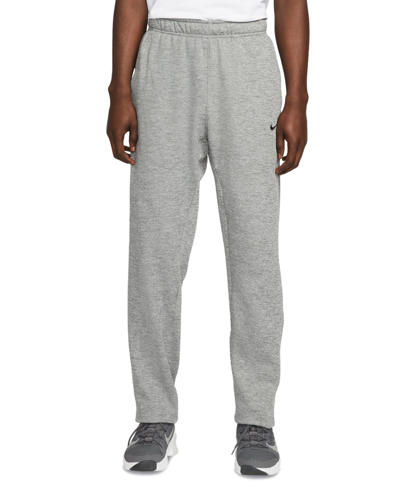 Shop Nike Men's Relaxed-fit Therma-fit Open Hem Fitness Pants In Dark Grey Heather