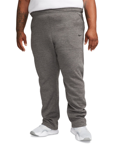 Shop Nike Men's Relaxed-fit Therma-fit Open Hem Fitness Pants In Charcoal Heather