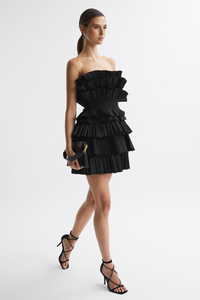 Shop Acler Strapless Tiered Mini Dress In Black