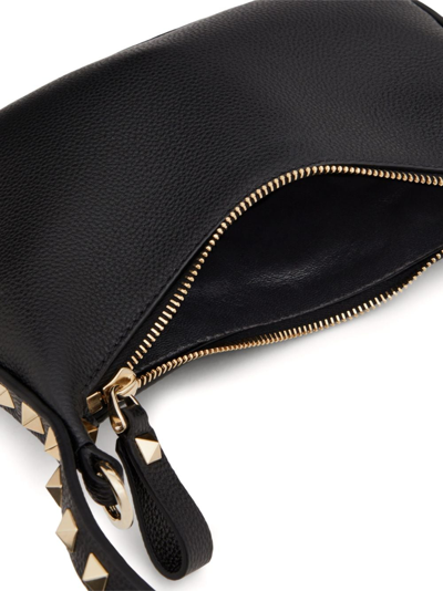 Shop Valentino Rockstud Leather Hobo Mini Bag In Black
