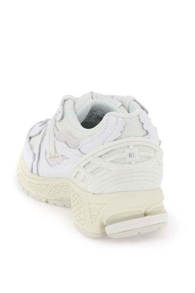 Shop New Balance 1906r Sneakers In White (white)