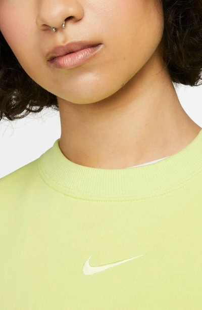 Shop Nike Sportswear Phoenix Sweatshirt In Light Lemon Twist/ Sail