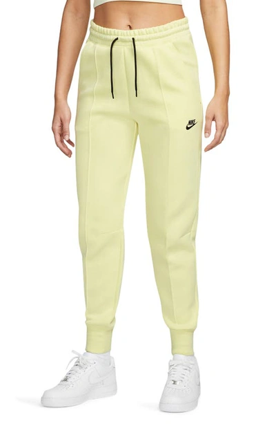 Shop Nike Sportswear Tech Fleece Joggers In Luminous Green/ Black