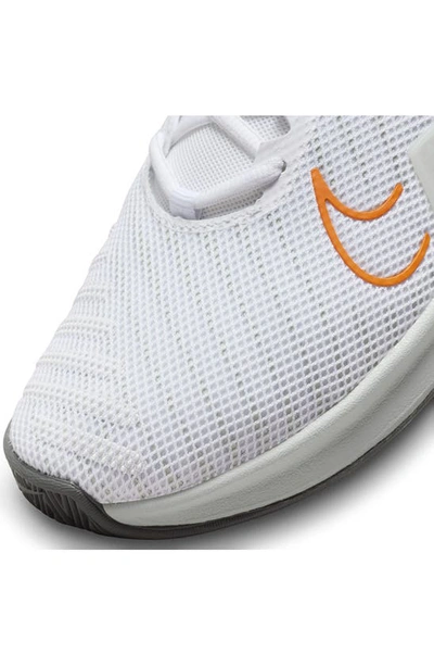 Shop Nike Metcon 9 Training Shoe In White/ Silver/ Bright Mandarin