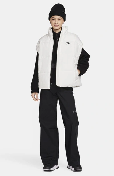 Shop Nike Sportswear Classic Water Repellent Therma-fit Loose Puffer Vest In Sail/ Black