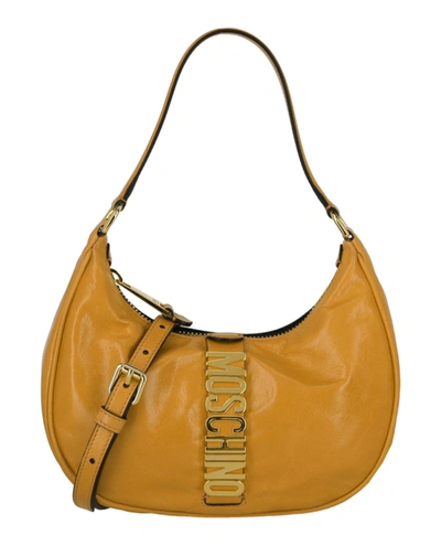 Shop Moschino Leather Logo Shoulder Bag In Brown