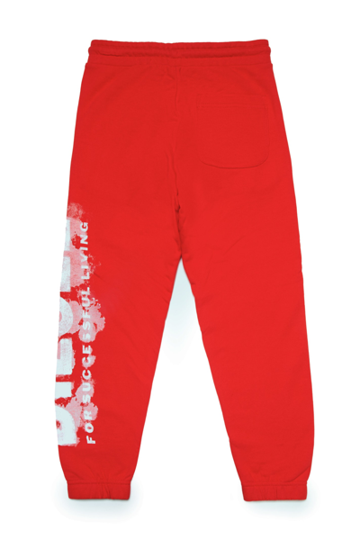 Shop Diesel Pstamp Trousers  Watercolor Effect Logo Jogger Pants In Fleece In Red