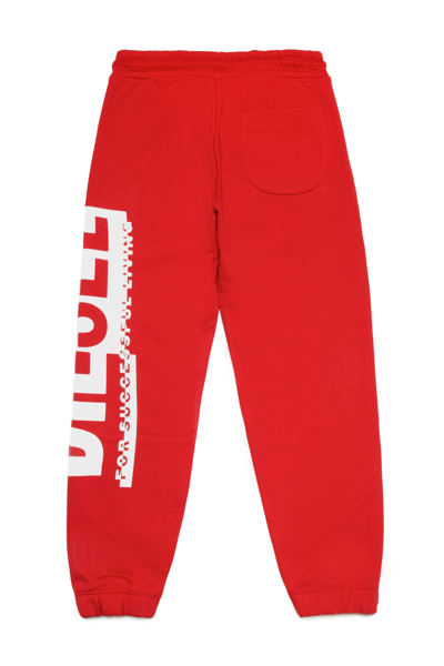 Shop Diesel Pfin Trousers  Jogger Pants In Fleece With Sectioned Logo In Red