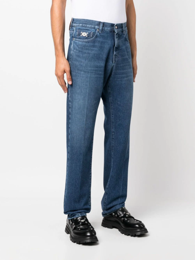 Shop Versace Regular-fit Jeans In Blue