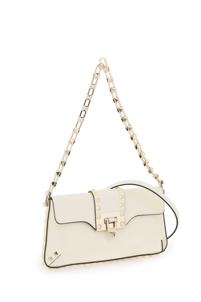 Shop Valentino Rockstud Shoulder Bag In White