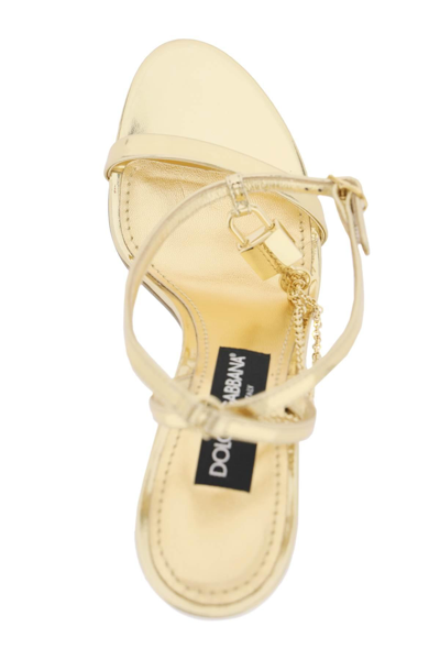 Shop Dolce & Gabbana Laminated Leather Sandals With Charm In Gold