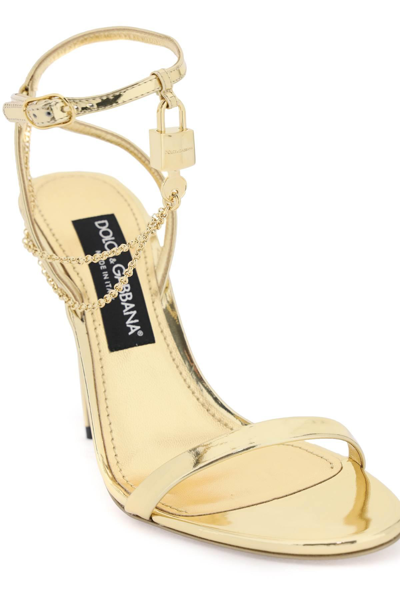 Shop Dolce & Gabbana Laminated Leather Sandals With Charm In Gold