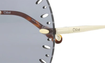Chloé Novelty 63mm Oversize Round Sunglasses In Gold Light Blue