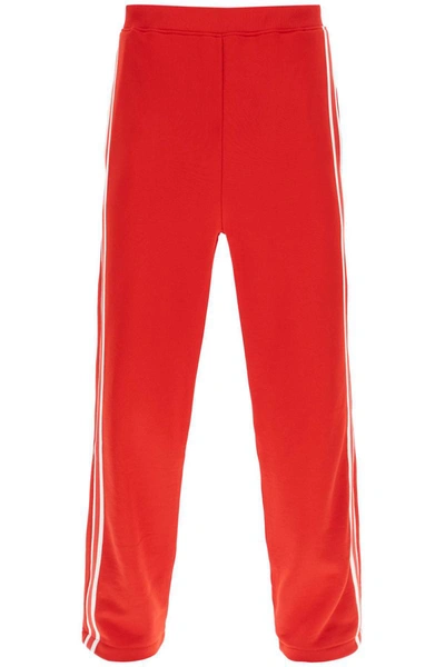 Shop Ami Alexandre Mattiussi Ami Paris Track Pants With Side Bands In Red