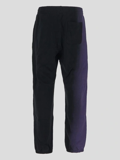 Shop Evisu Trousers In Black