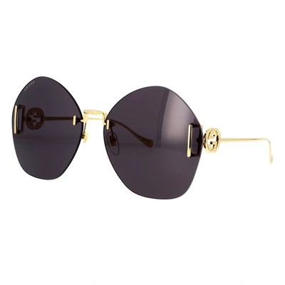 Shop Gucci Eyewear Sunglasses In Gold