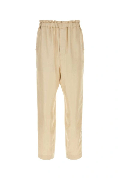 Saint Laurent Trousers With Front Pleats And Back Pockets In Stripped