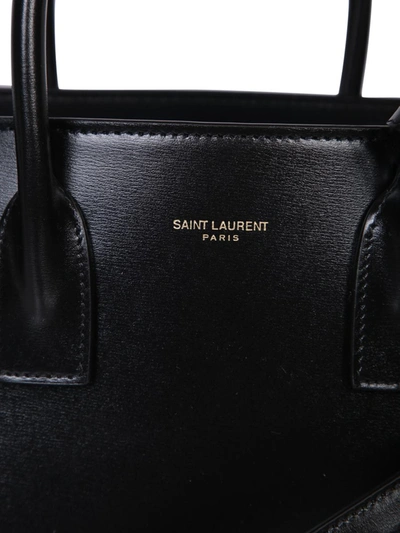 Shop Saint Laurent Top Handles In Black