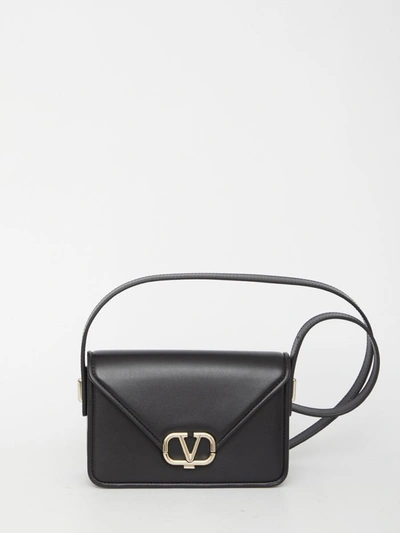 Shop Valentino Small Letter Bag In Black