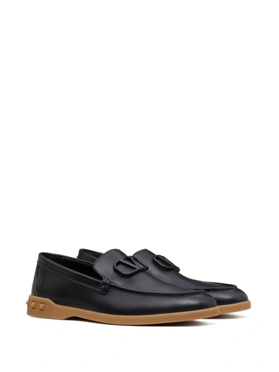 Shop Valentino Garavani Leisure Flows Leather Loafers In Black