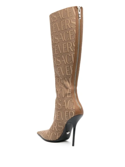 Shop Versace Boots In Beige/brown