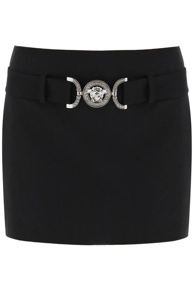 Shop Versace Medusa Buckle Mini Skirt In Black