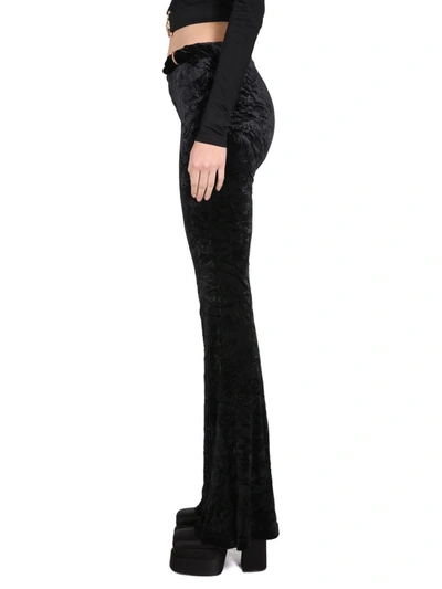 Shop Versace Velvet Flared Pants In Black