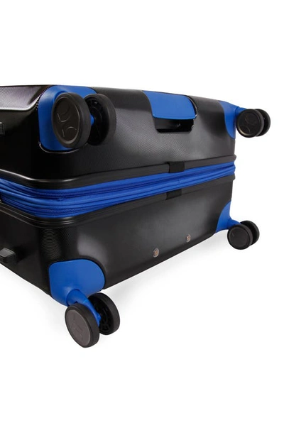 Shop Hurley Wave 29" Hardshell Spinner Suitcase In Black/ Blue