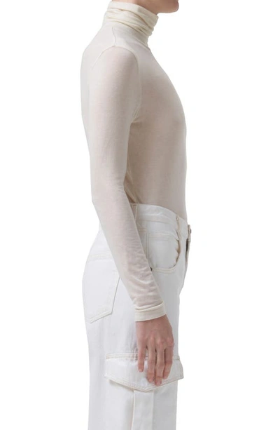 Shop Agolde Pascale Turtleneck Long Sleeve T-shirt In Oat Milk