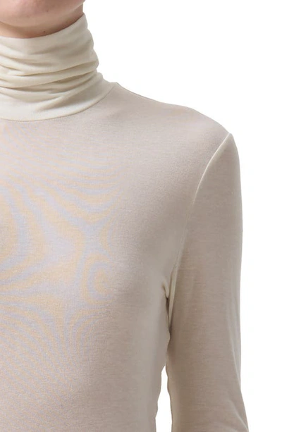 Shop Agolde Pascale Turtleneck Long Sleeve T-shirt In Oat Milk