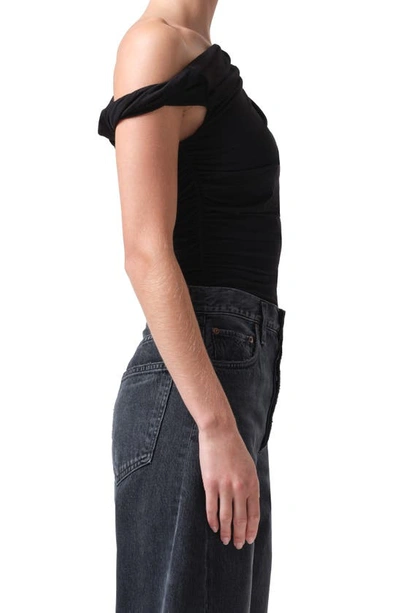 Shop Agolde Hilma Twist One-shoulder Bodysuit In Black