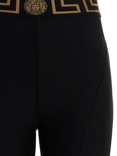 Shop Versace Greca Leggings Black