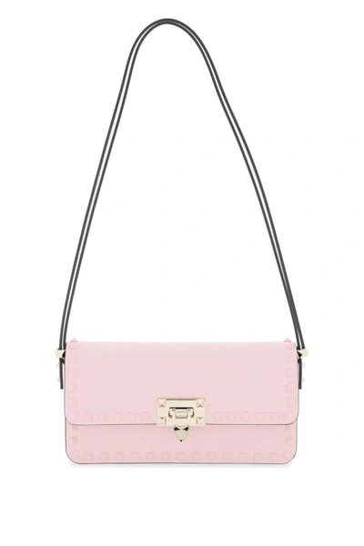 Shop Valentino Garavani Rockstud23 East-west Leather Shoulder Bag In Pink