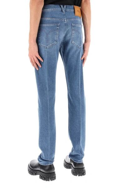 Shop Versace Stretch Denim Slim Fit Jeans In Blue
