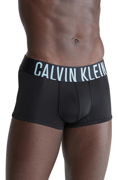 Shop Calvin Klein Assorted 3-pack Intense Power Micro Low Rise Trunks In Black/ Teal Blue Band