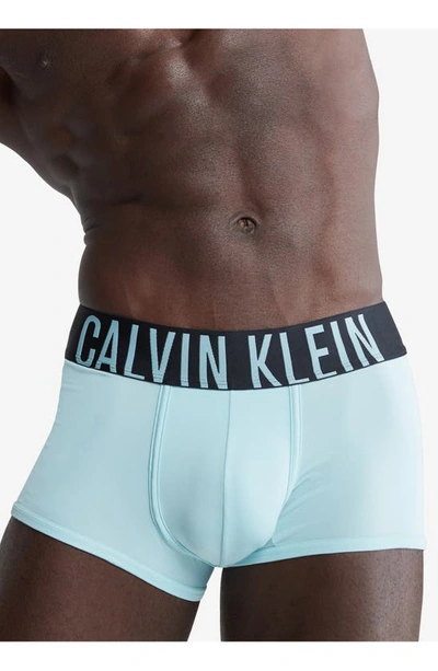 Shop Calvin Klein Assorted 3-pack Intense Power Micro Low Rise Trunks In Atlantic Multi
