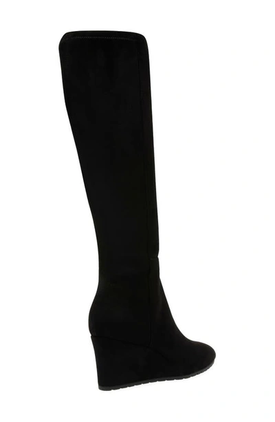 Shop Anne Klein Vella Knee High Wedge Boot In Black Ms