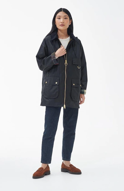 Shop Barbour Highclere Hooded Waxed Jacket In Black/ Classic/ Dress/ Ancient