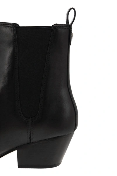 Shop Michael Kors Kinlee Leather And Stretch Knit Ankle Boot In Black