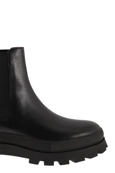 Shop Michael Kors Rowan Leather Chelsea Boot With Logo In Black